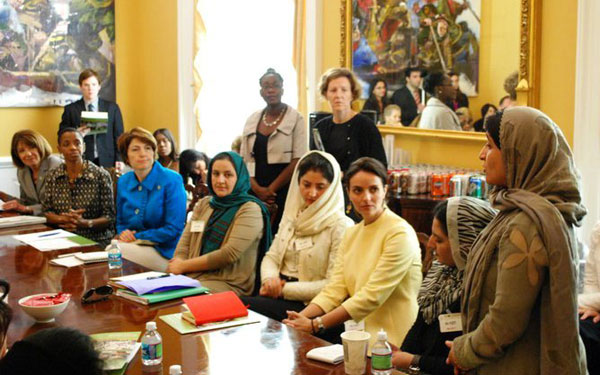 AWTF-Launch Members of the Afghan women's task force seated around a table