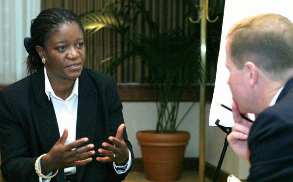 zainab_special_representative A woman speaks in an office setting.