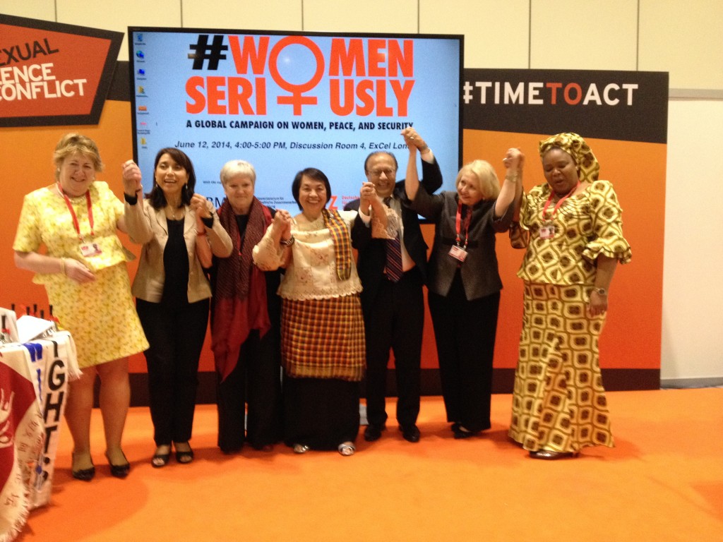 Alongside a cast of dedicated advocates, Irene Santiago celebrates the launch of the Women.Seriously! campaign. From left to right, Baroness Mary Goudie, Luz Mendez, Ruth-Gaby Vermont-Mangold, Irene Santiago, Ambassador Anwarul Chowdhury, Melanne Verveer, and Leymah Gbowee.