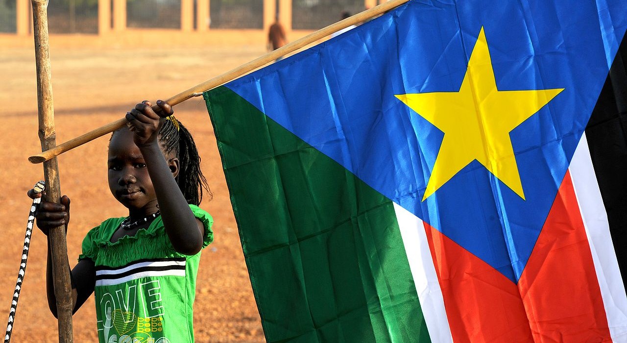 girl waving flag