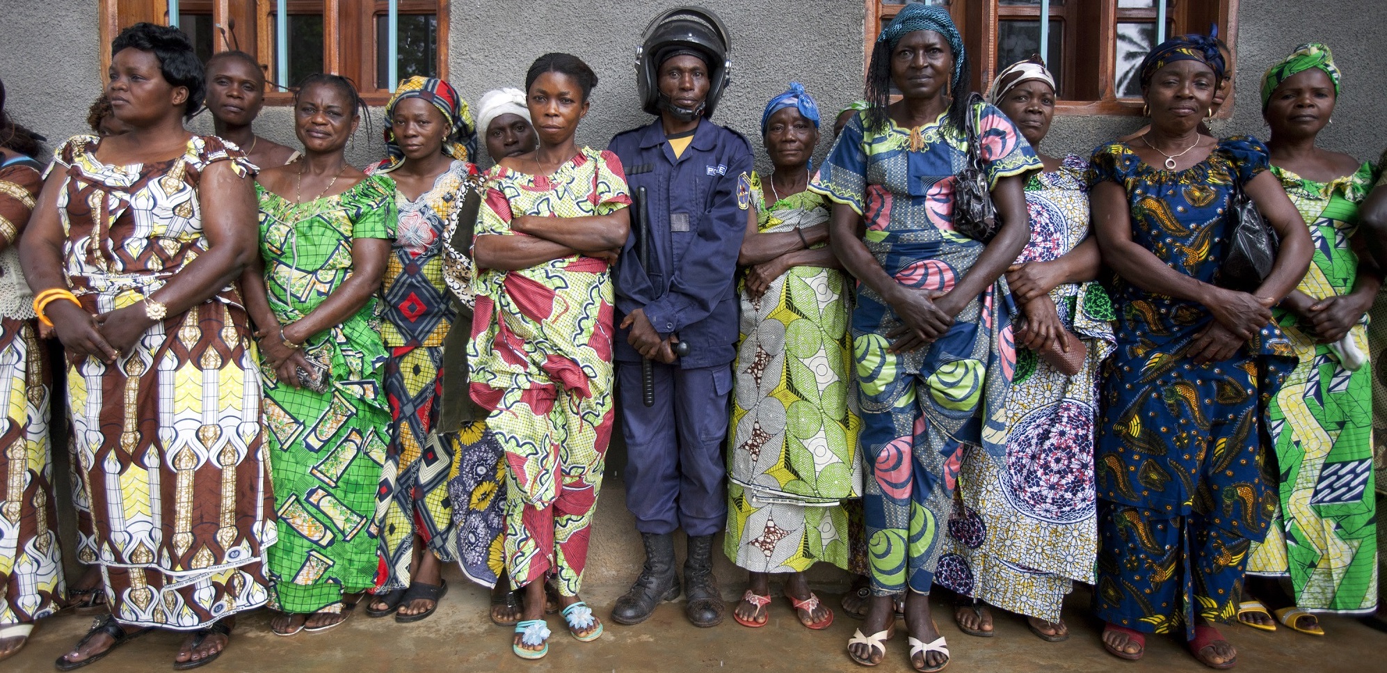 women outside DRC police station